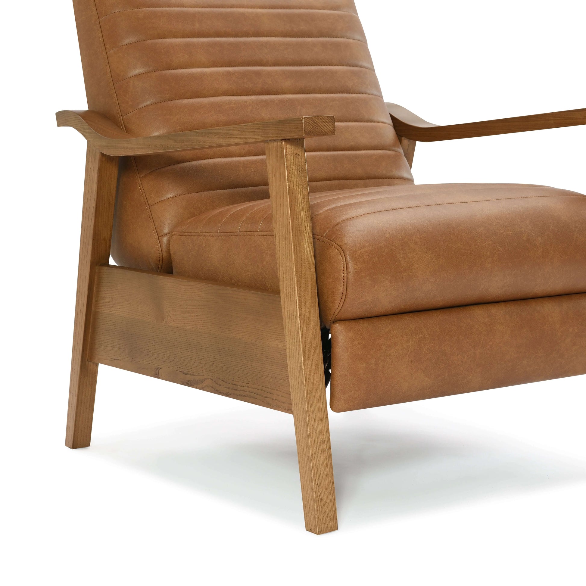 Footrest of a brown faux leather recliner chair on a white background