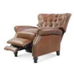 Brown wingback leather recliner chair with footrest extended and tufted backrest on a white background