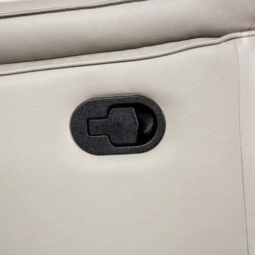 Close-up of a beige leather recliner chair with a black plastic pull tab.