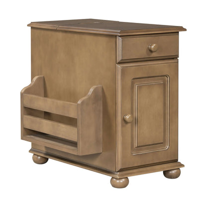 Wooden end table with a magazine holder, drawer and cabinet on a white background