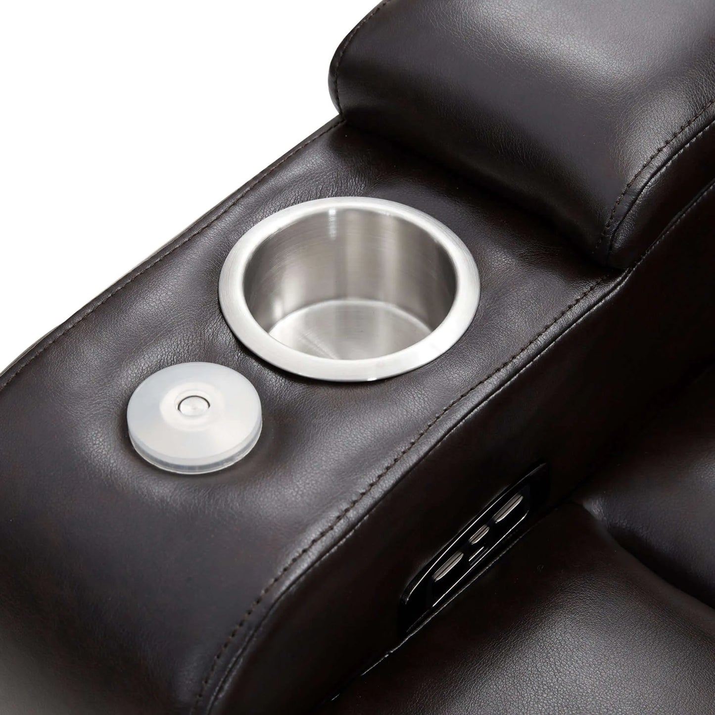Close-up of a black faux leather power motion recliner chair arm rest with stainless steele cup holder and power button on a white background 