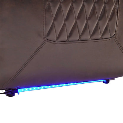 Close-up of a brown faux leather power motion recliner chair of blue LED strip lighting on bottom of chair on a white background