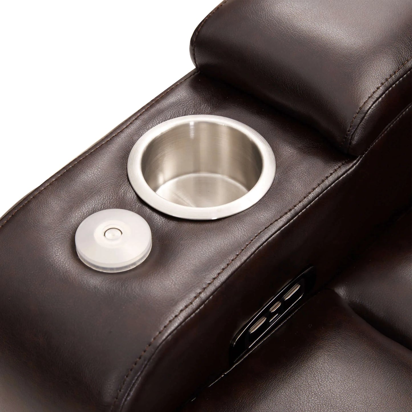 Close up of a brown faux leather power motion recliner chair armrest with cup holder, USB portss and controls on a white background