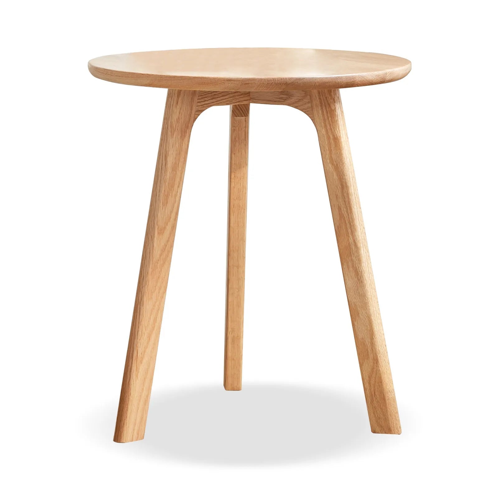 Wooden side table with three legs on a white background