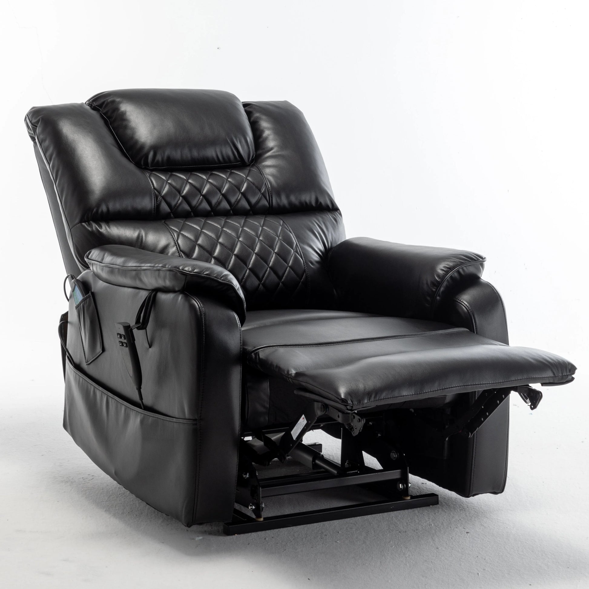 Black leather recliner chair with fully extended footrest on a white background
