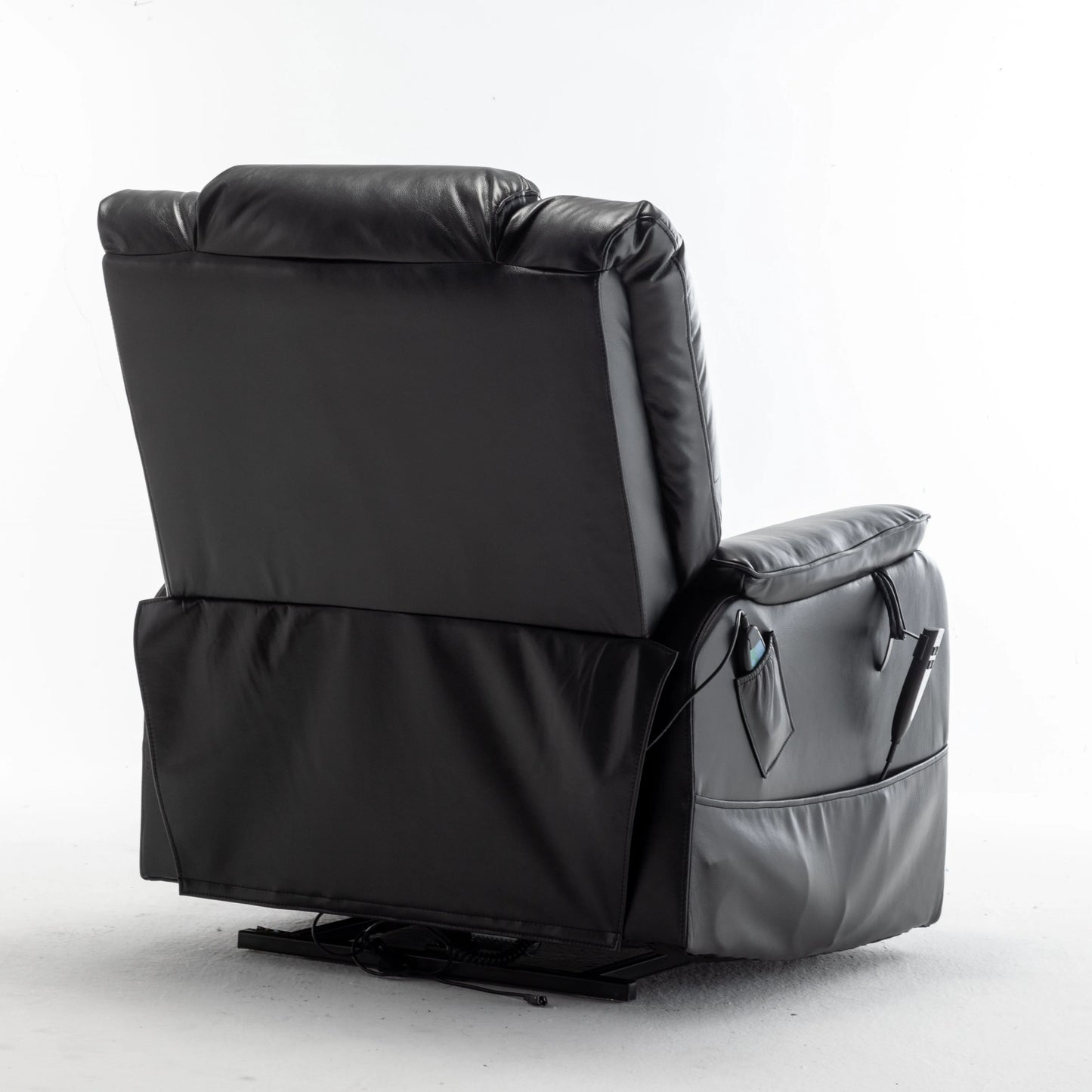 Black leather recliner chair on a white background