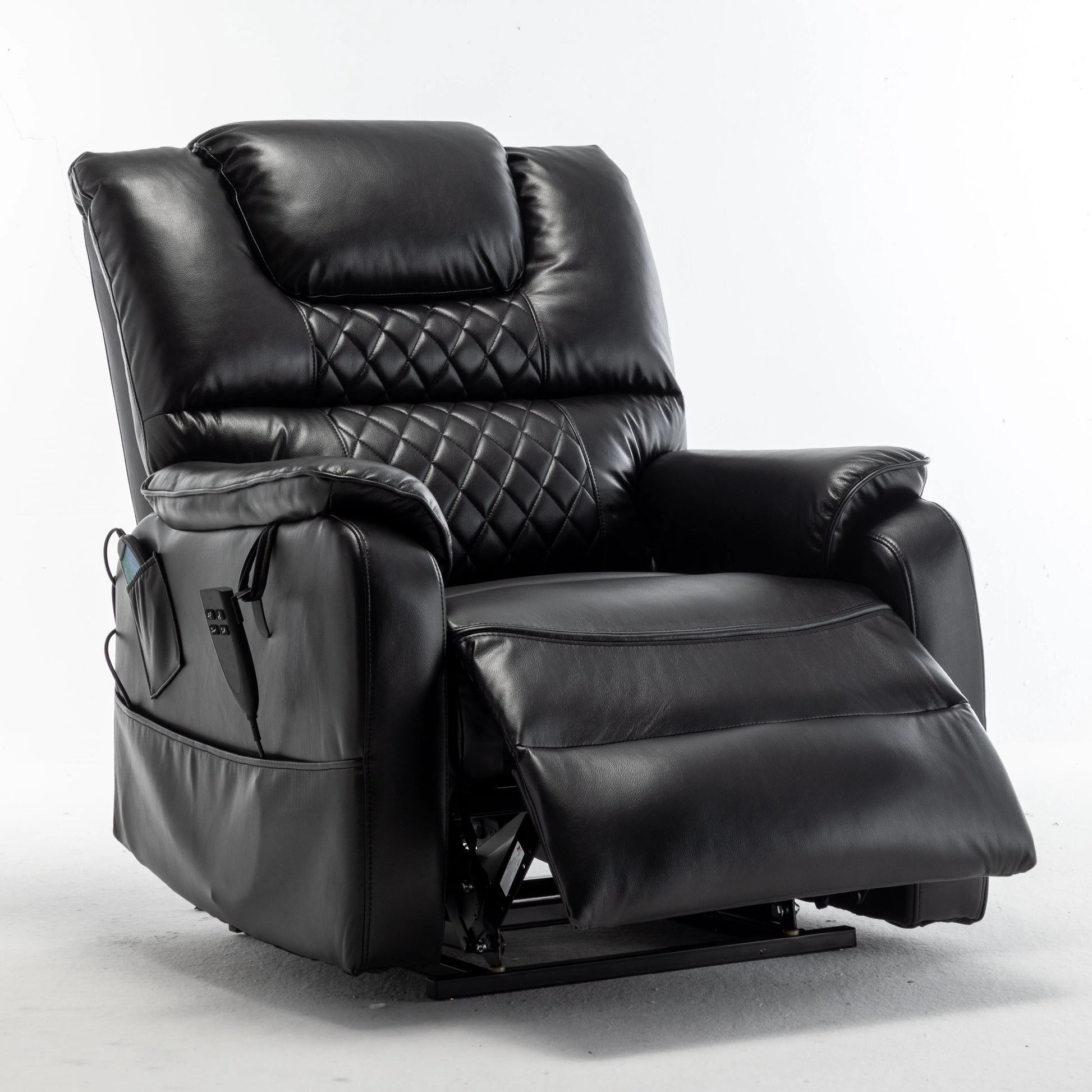 Black leather recliner chair with a partially extended footrest on a white background