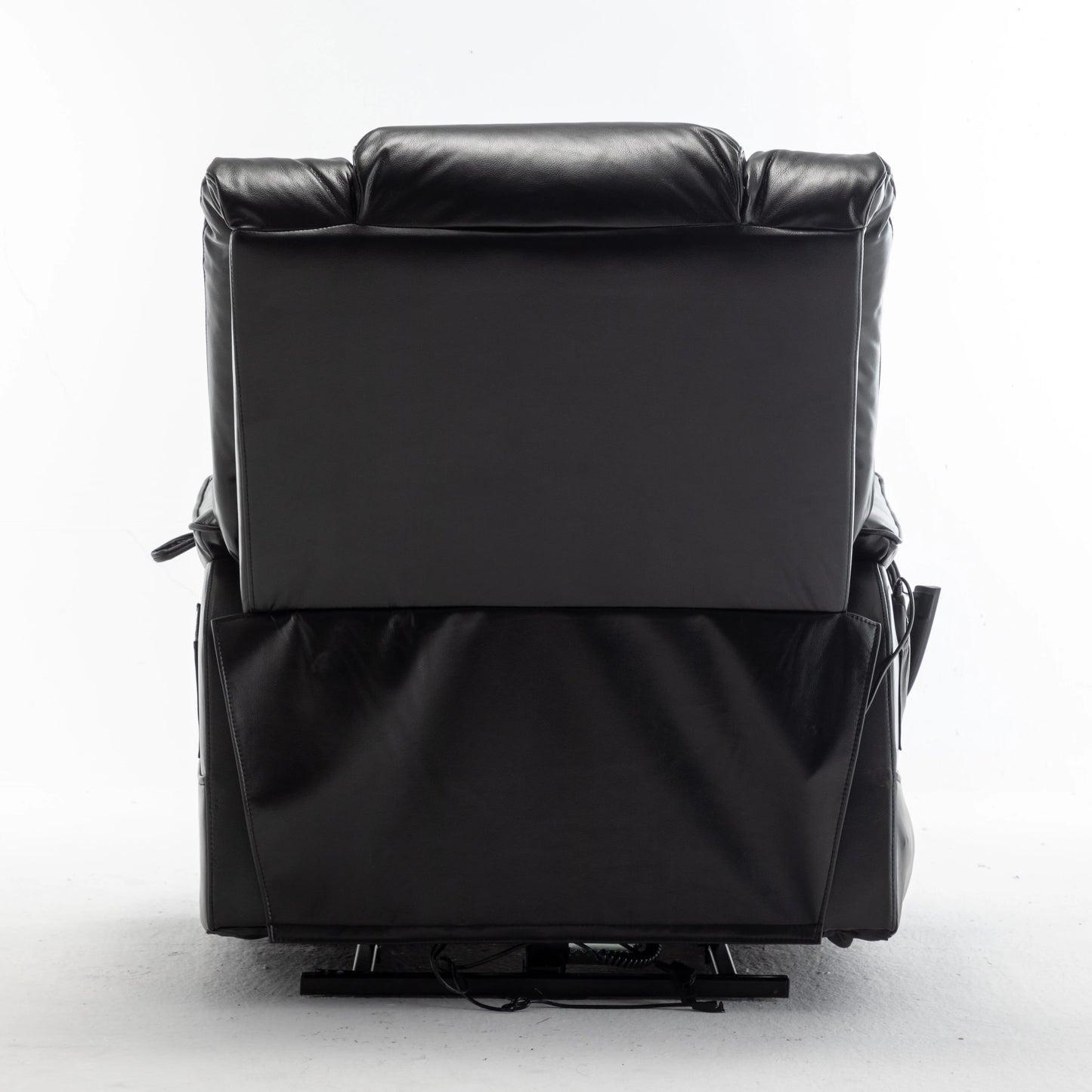 Back of a black leather recliner chair on a white background