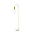 Modern floor lamp with gold arch and marble base on a white background