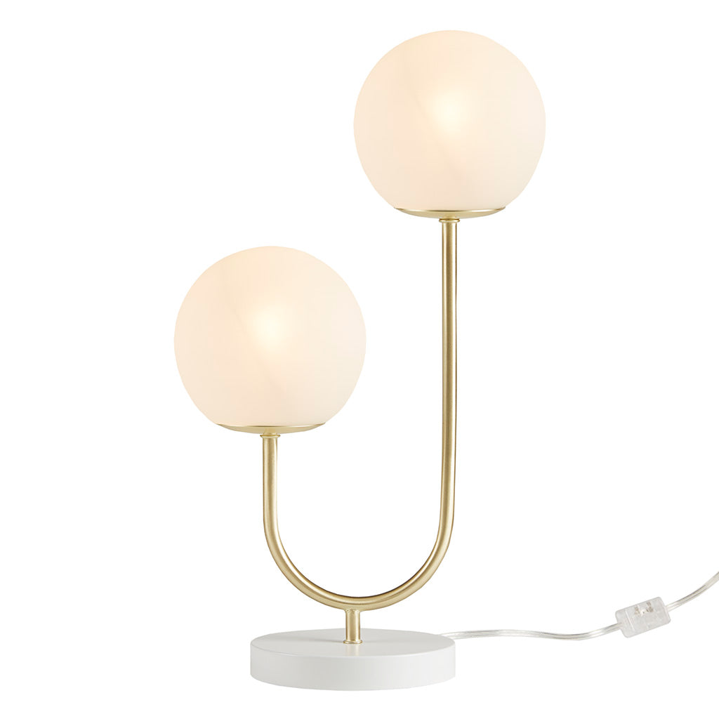 Table lamp with two round glass shades on a white background