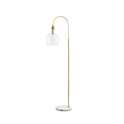 Floor lamp with a curved arm, clear glass shade, and marble base on a white background