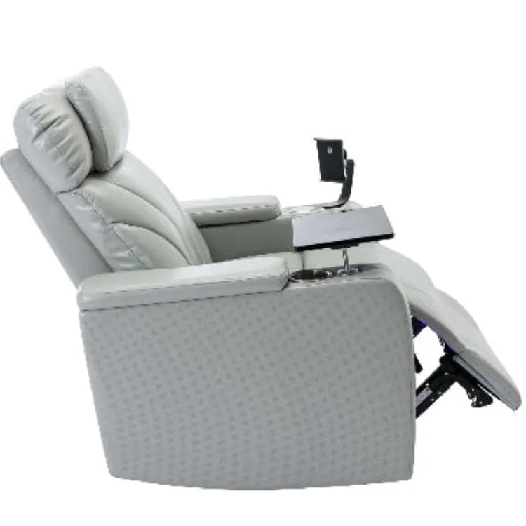 Side view of a gray faux leather recliner chair with cup holder and tablet stand on a white background