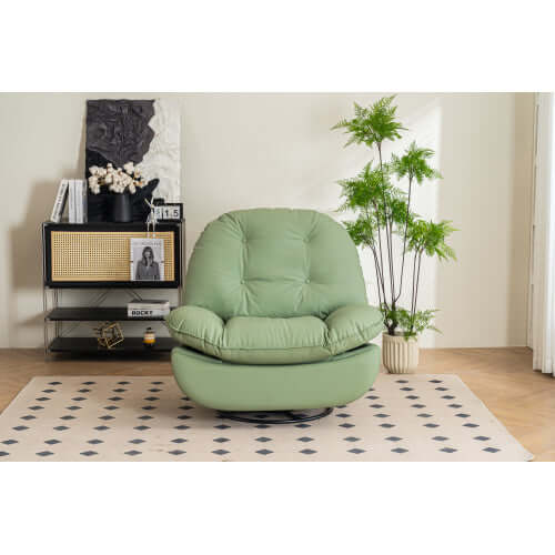 Green leather reclining chair in a living room setting with decor elements.