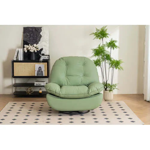 Green leather reclining chair in a living room setting with decor elements.