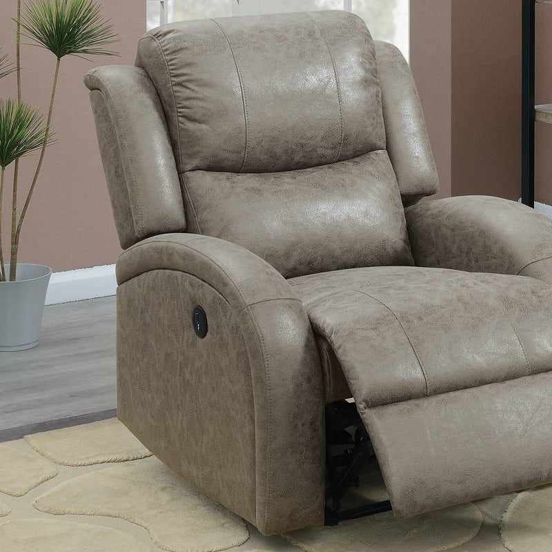 Gray faux leather recliner chair in a room with a plant and rug.