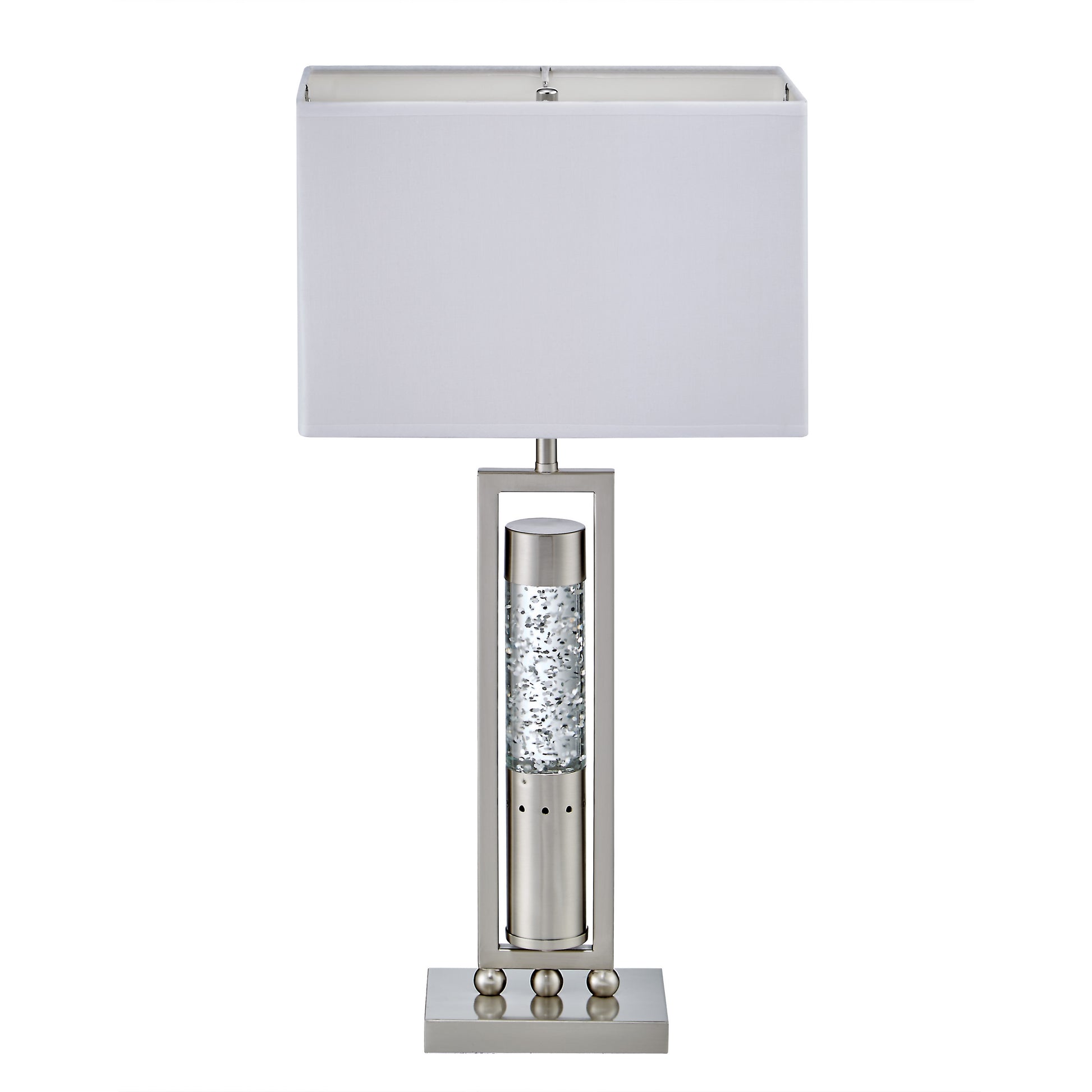 Table lamp with a white shade and decorative base on a white background
