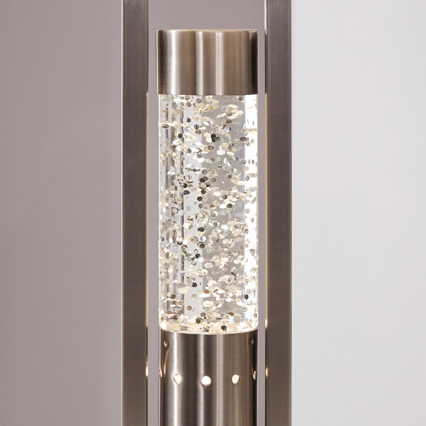 Decorative lamp base with crystal accents on a neutral background