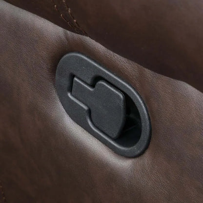 Close-up of manual latch on a brown faux leather glider recliner.