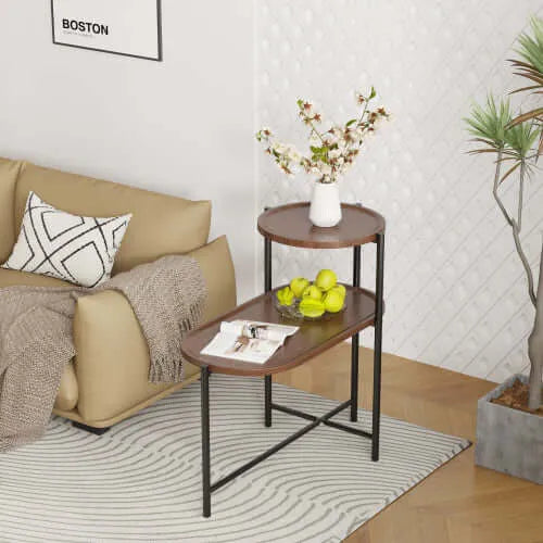 Living room with beige sofa, 2-tier wooden and metal end table, and decorative elements.