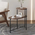 Wooden and metal end table with two shelves in a living room setting.