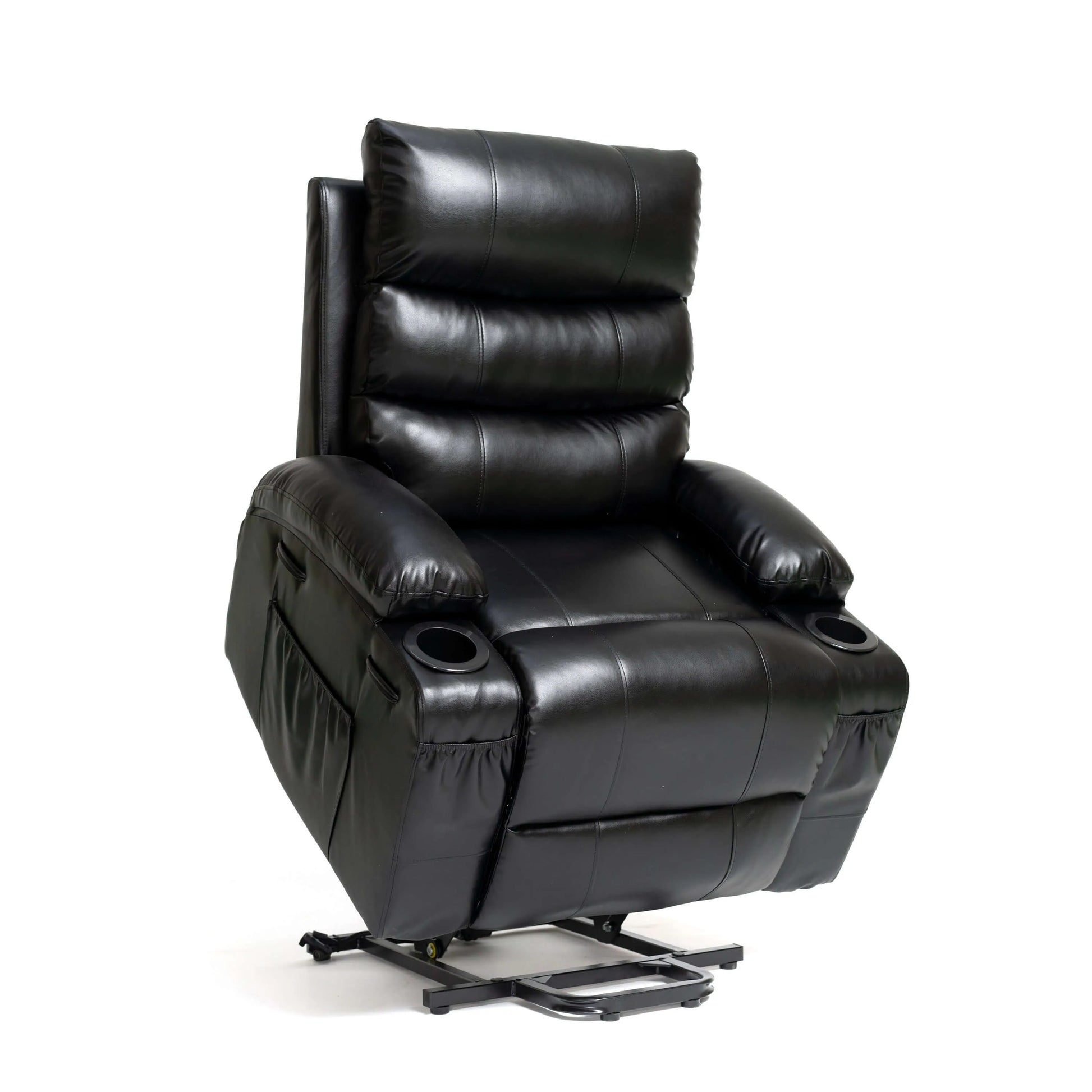 View of a black faux leather power lift recliner chair in full lift position on a white background