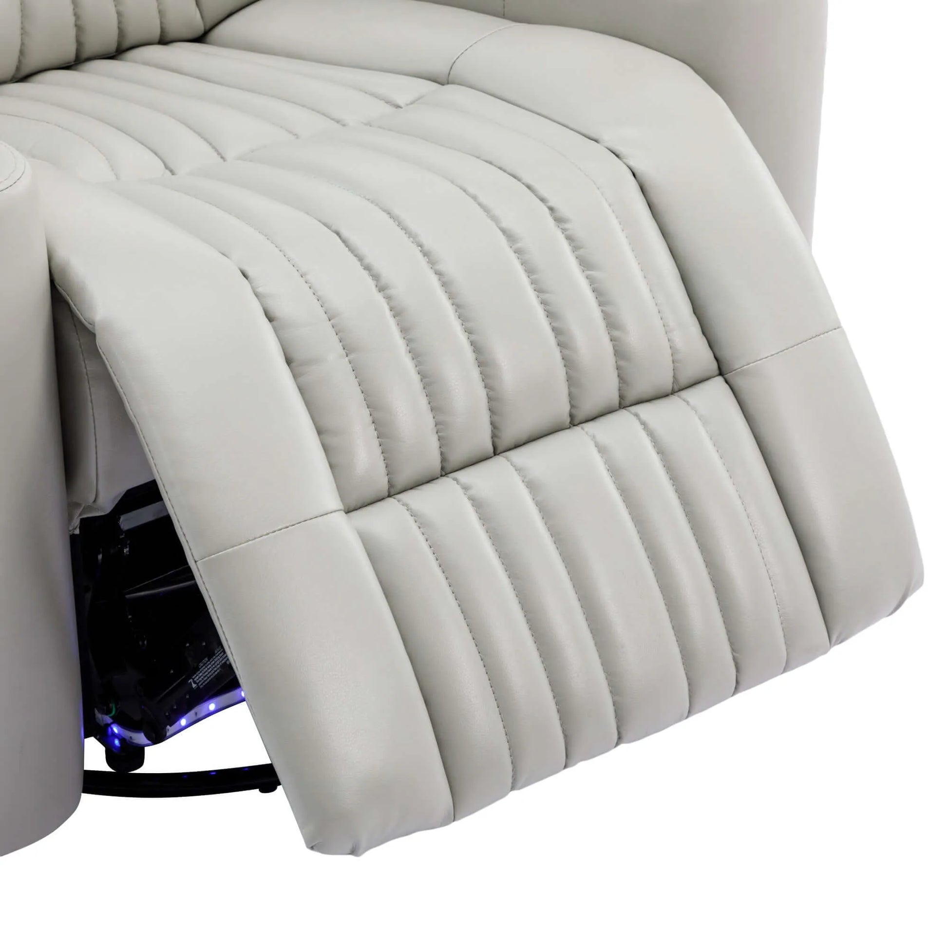 Gray recliner chair footrest with visible stitching on a white background