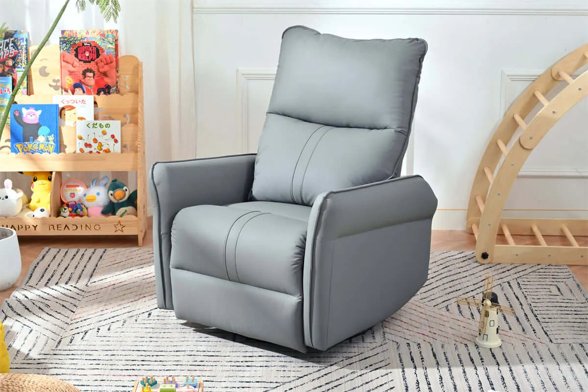 Gray recliner chair in a room with children's books and toys.