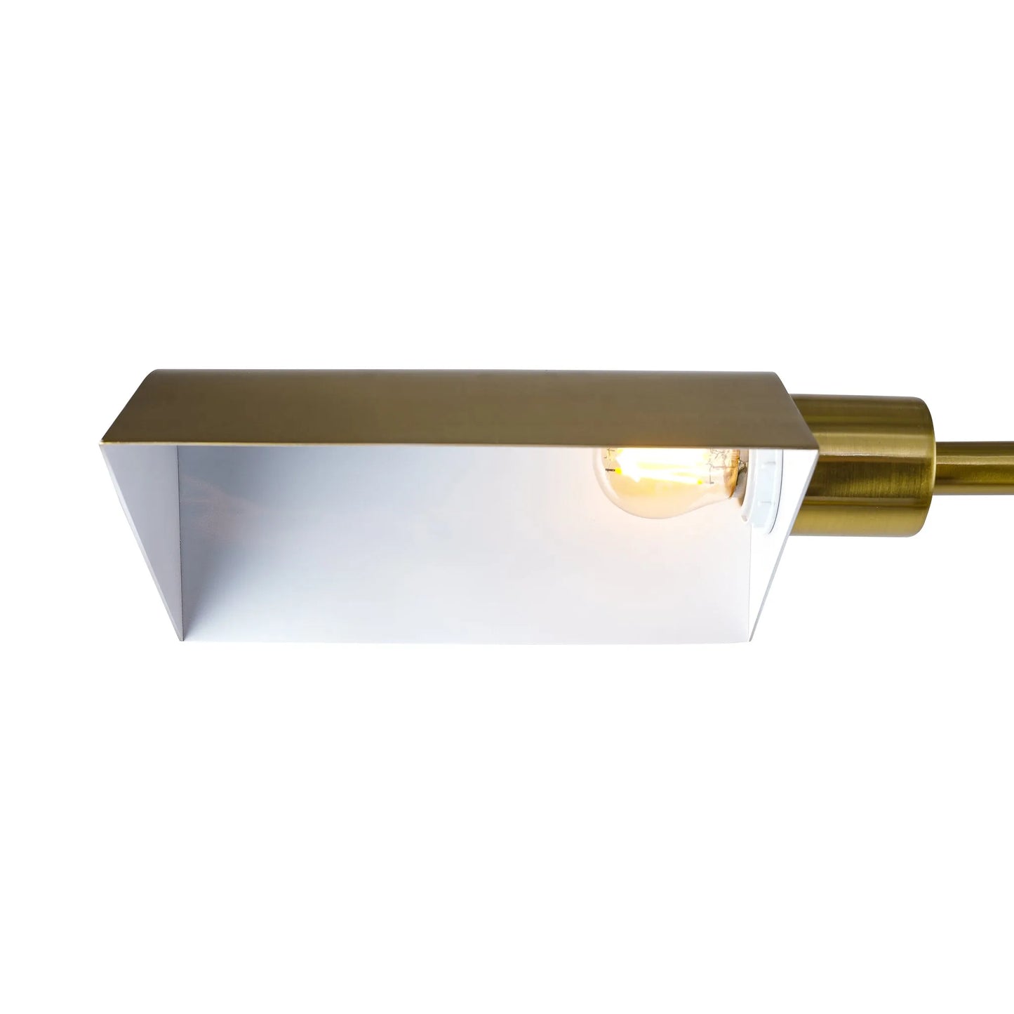 Close up of brass floor lamp shade and light bulb on a white background