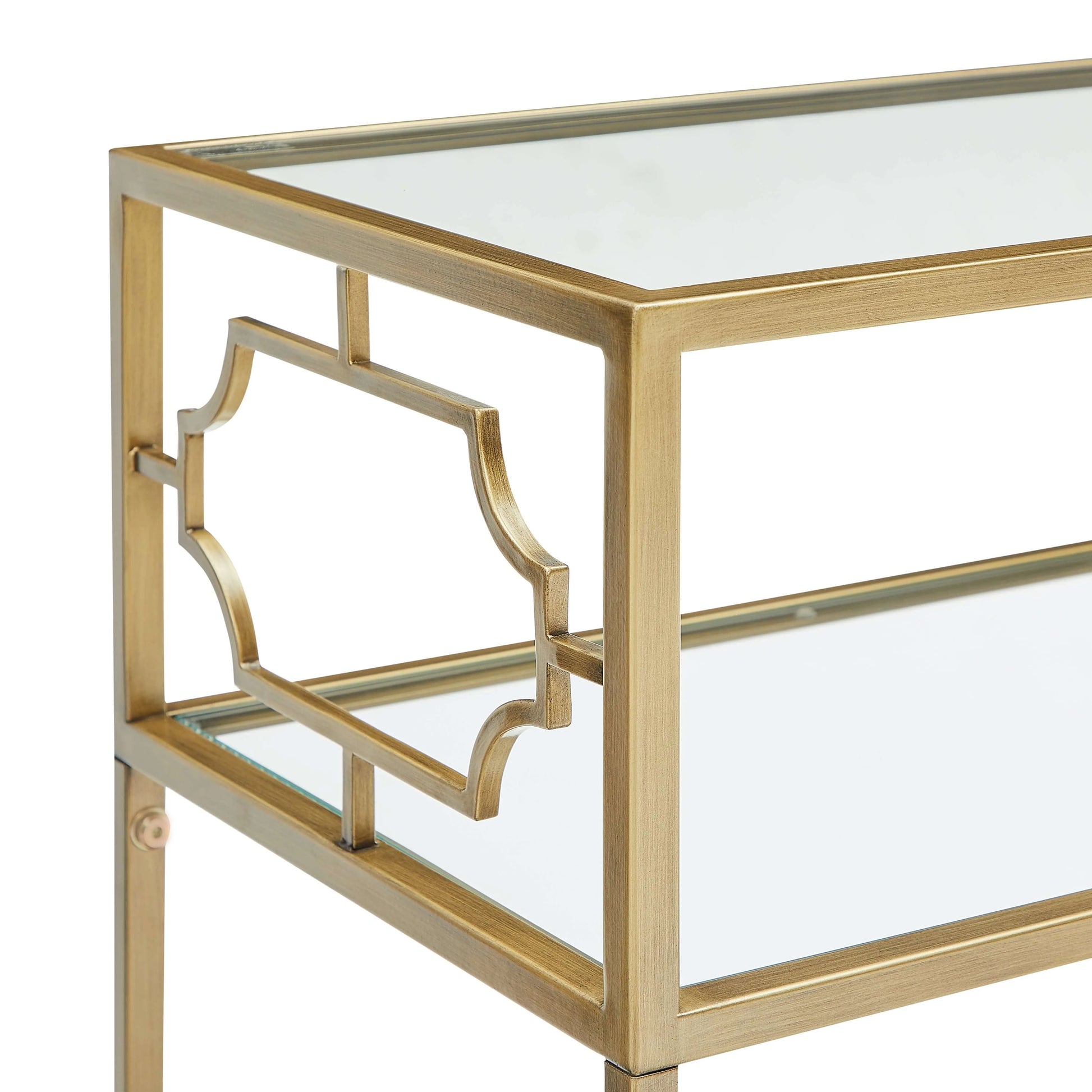 Gold-framed glass table on a white background