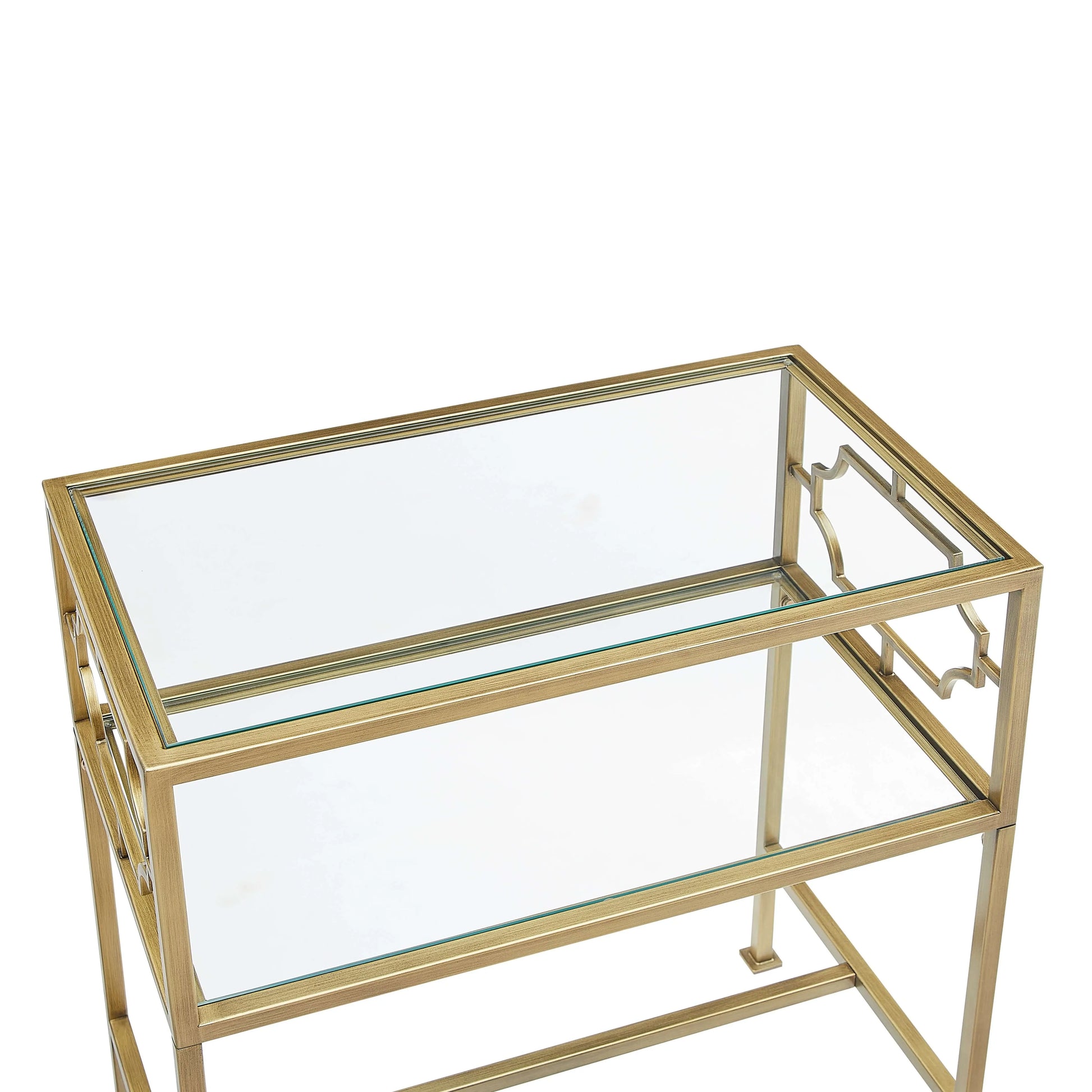Gold-framed glass-top table on a white background