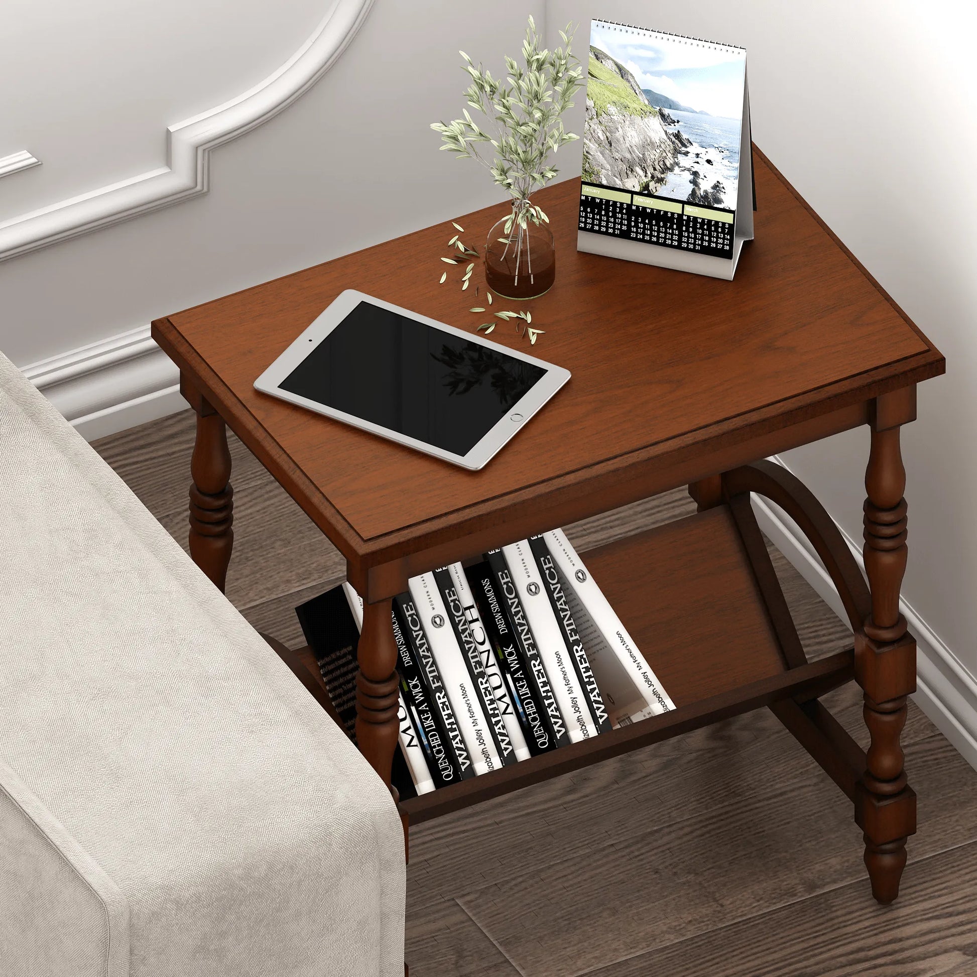 Wooden side table with books, tablet, and vase in a room setting