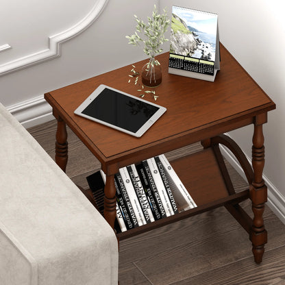 Wooden side table with books, tablet, and vase in a room setting