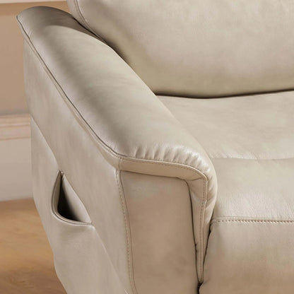 Close-up of a cream color leather recliner arm rest corner