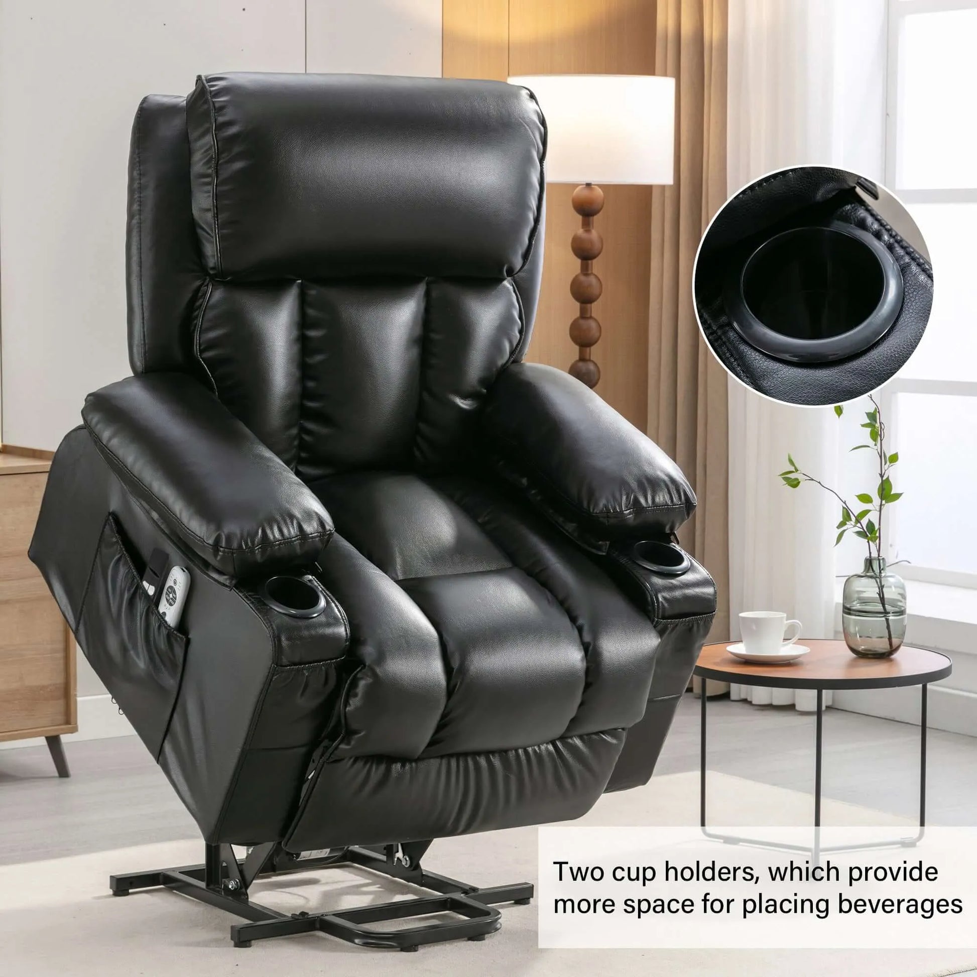 Black leather lift recliner chair with cup holders in a living room setting