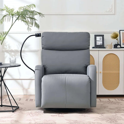 Front view of a gray recliner chair in a room with a plant and side table.