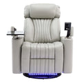 Gray recliner chair with cup holders and LED lighting on a white background