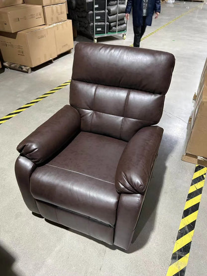 Brown leather recliner chair in a warehouse setting