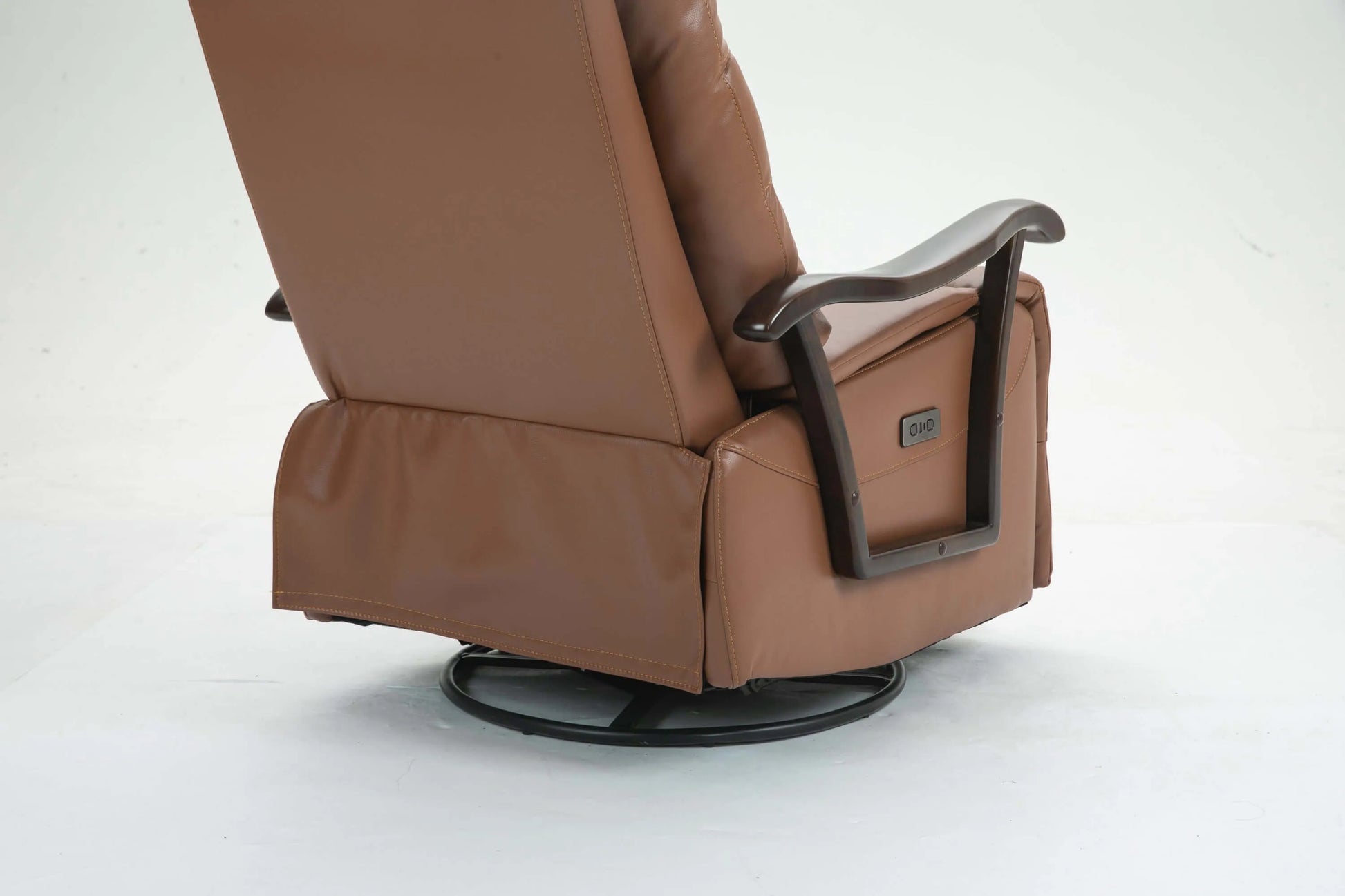 Brown recliner chair with wood arms, power control panel and black metal base on a white background
