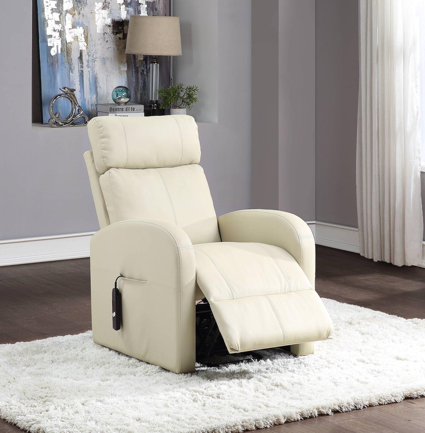 Beige recliner chair in a room with a lamp and decorative items on the wall.