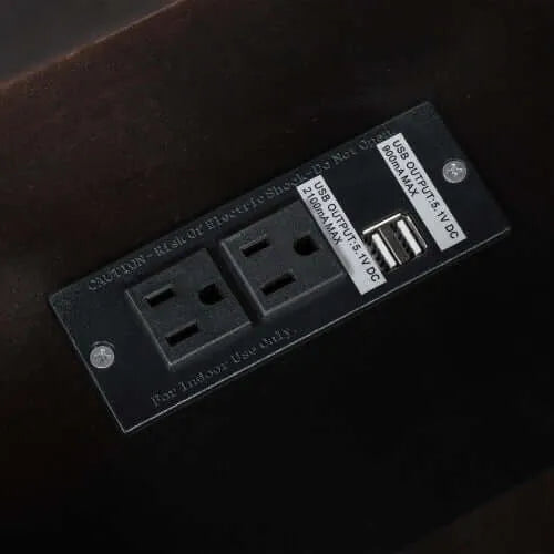 Electrical outlet panel with multiple sockets on a dark background