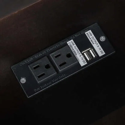 Electrical outlet panel with multiple sockets on a dark background