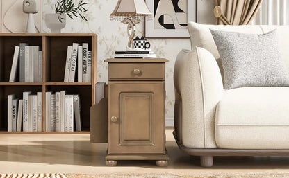 Living room with a beige sofa, wooden side table, and bookshelf.