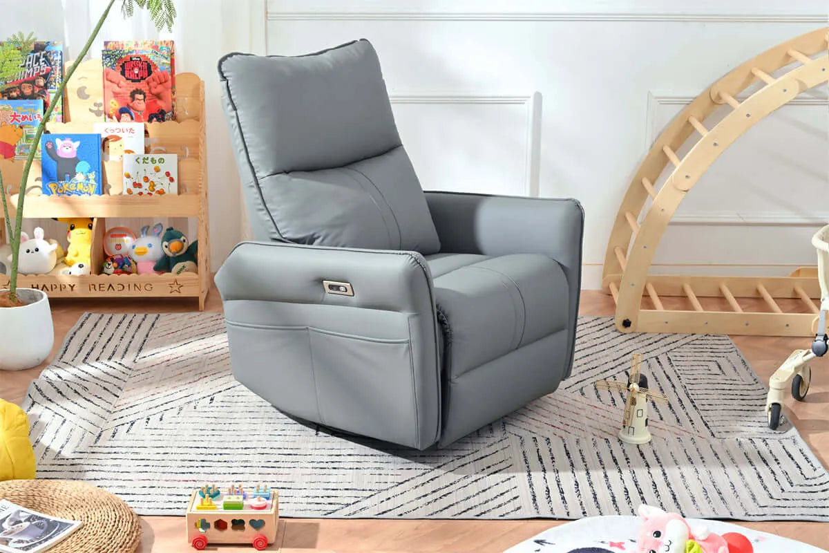 Side view of a gray recliner chair in a child-friendly room with toys and books.