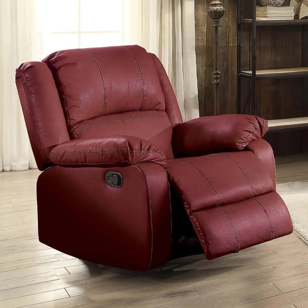 Red leather recliner chair in a living room setting