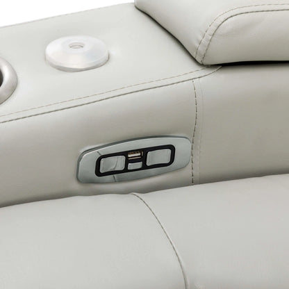 Close-up of a control panel on a gray leather recliner chair