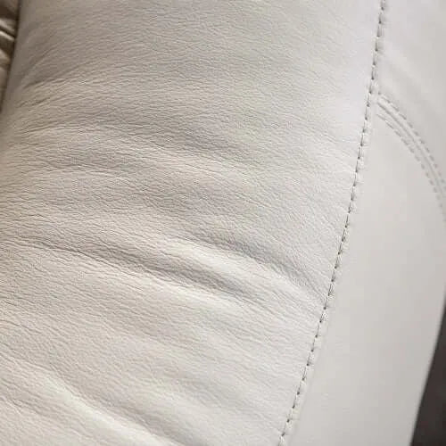Off-White Manual Glider Recliner – Pillow Top Arms & Welt Trim