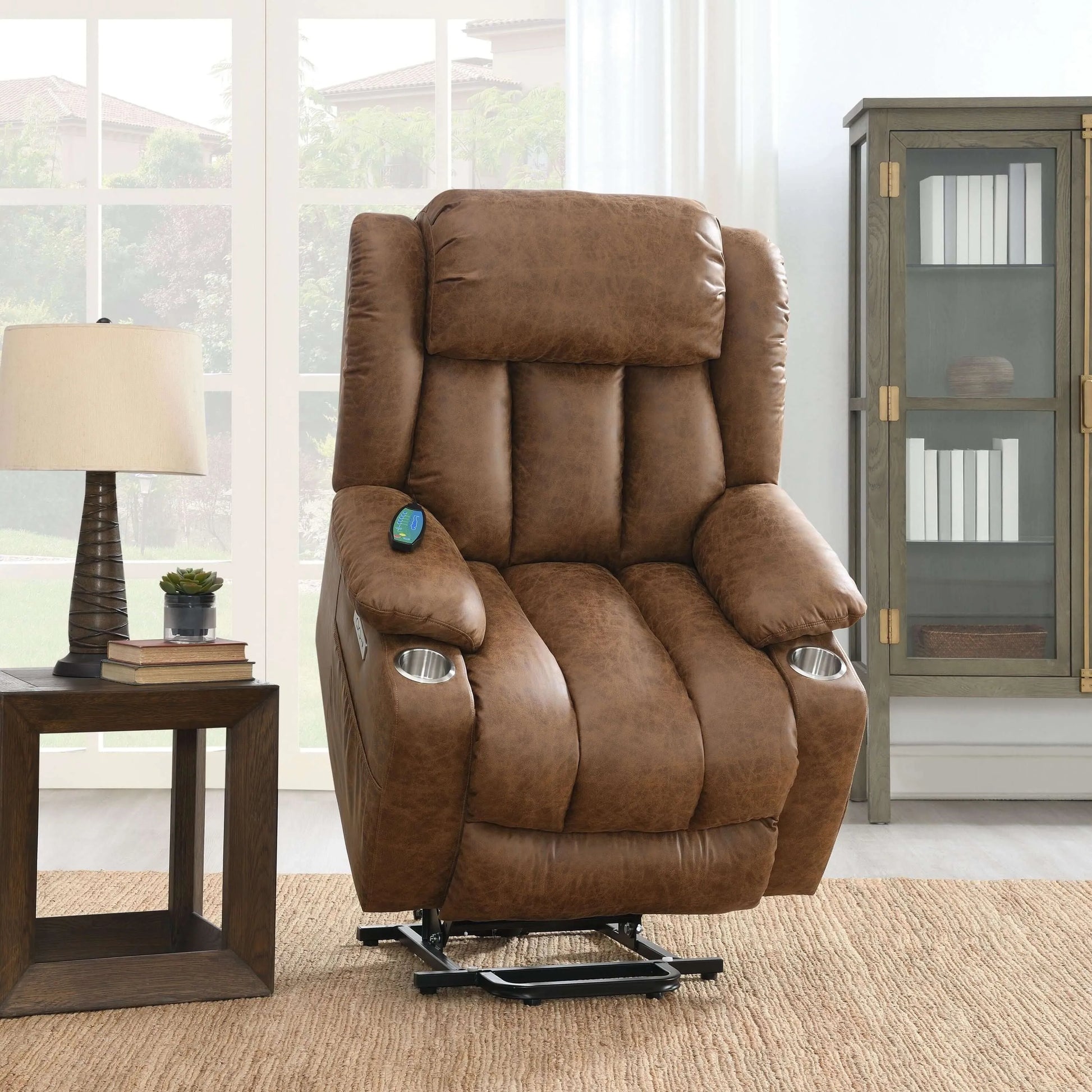 Brown leather recliner lift chair in a living room setting with a side table and lamp.