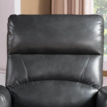 Black faux leather recliner chair in a room with beige curtains and a window.