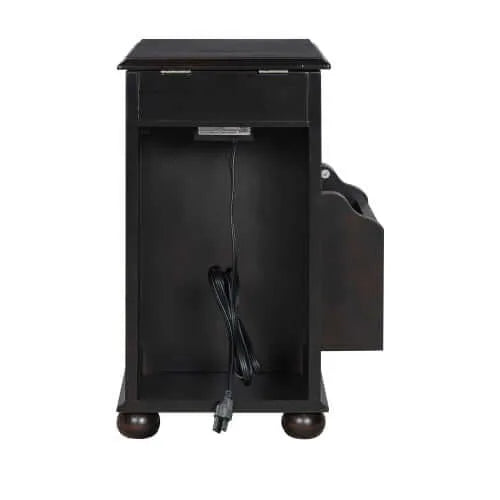 Back side of a dark brown end table with a drawer and power cord on a white background