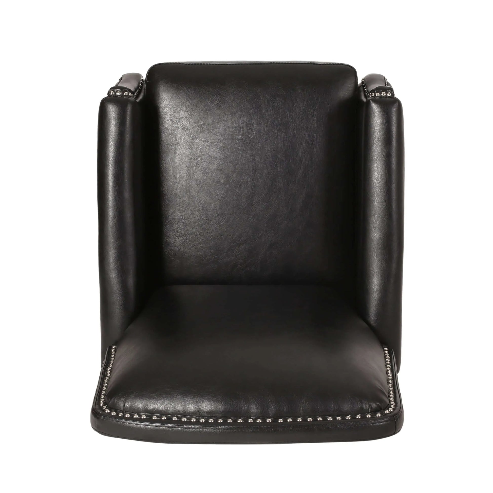 Top view of a black leather chair with studded details on a white background